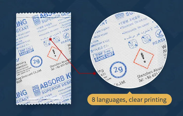 Detail cetak delapan bahasa pada sachet desiccant Absorbking